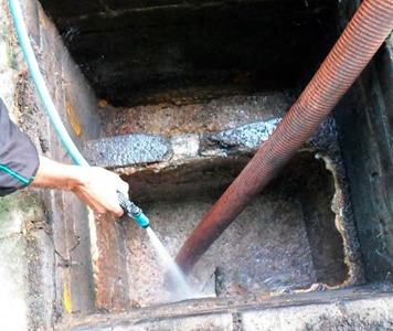 Limpeza de caixa de gordura em comércios de alimentação